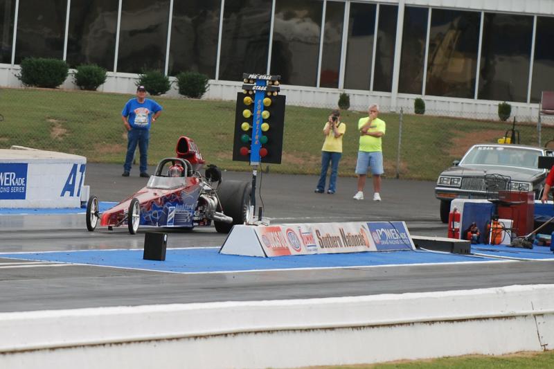 Bobby and Alyssa watching in the background